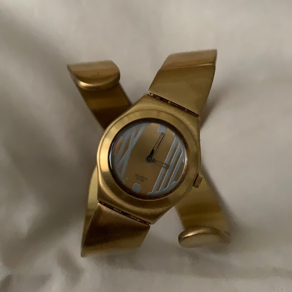 Gold Swatch watch